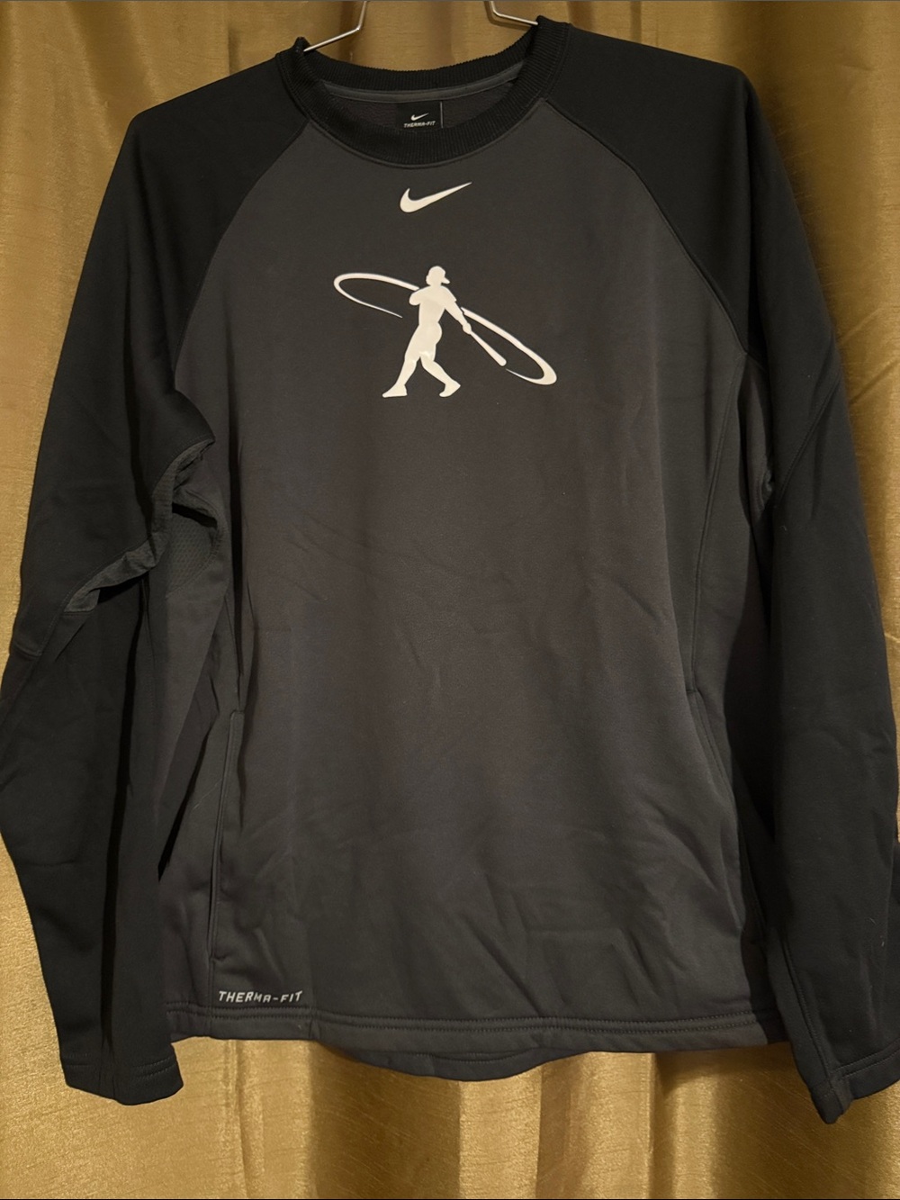 Nike Swingman Therma-FIT crew sweatshirt.
